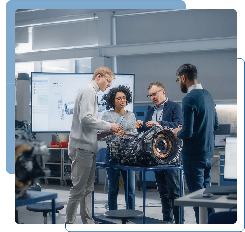 Engineers discussing machinery in a modern lab.